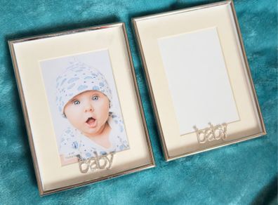 Set of 2 silver-toned metal photo frames.