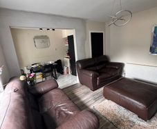 2 leather sofa and puff