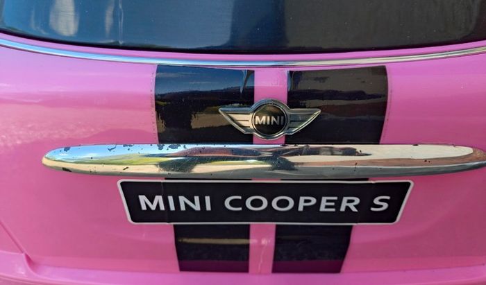 Kids Pink Electric Mini Cooper Car (used).