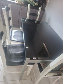 Black Glass Table And 4 Black And White Wooden Chairs