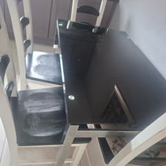 Black Glass Table And 4 Black And White Wooden Chairs