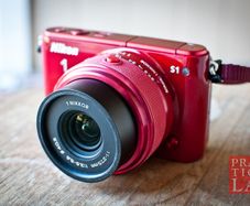 Nikon 1 S1 Mirrorless Red Camera with Standard and Wideangle lenses