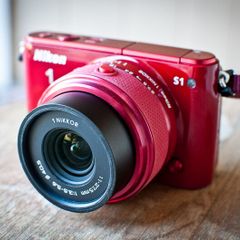 Nikon 1 S1 Mirrorless Red Camera with Standard and Wideangle lenses