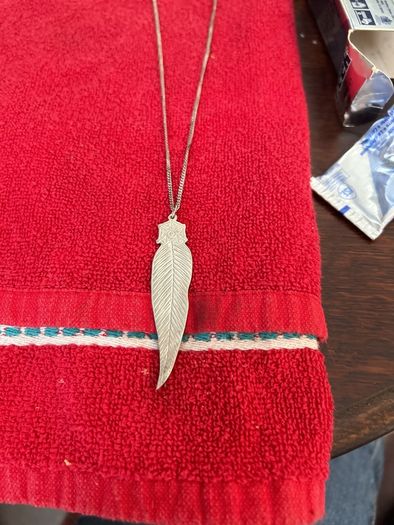 silver feather pendant and chain