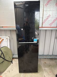 Beko fridge freezer and plug in room heater