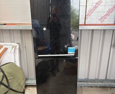 Beko fridge freezer and plug in room heater