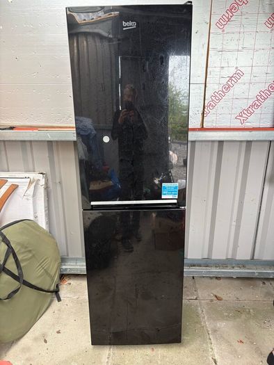 Beko fridge freezer and plug in room heater