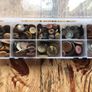 Box of assorted Brown/ grey buttons. Image 6