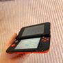 New Nintendo 3DS XL Orange and Black Image 7