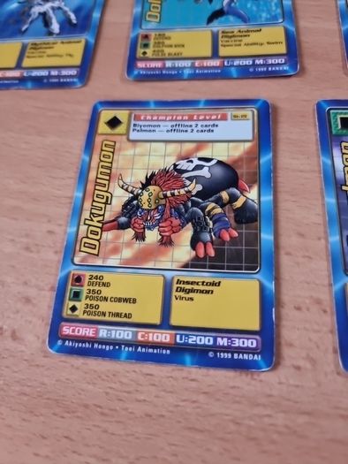 13 Champion level Digimon cards. 1999.