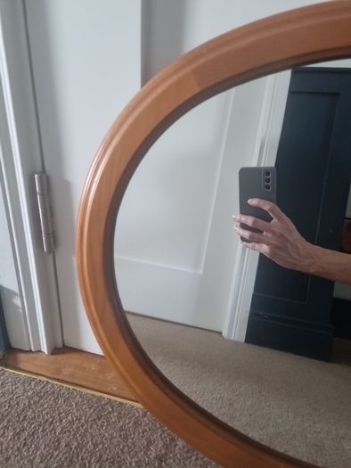 Wooden oval mirror