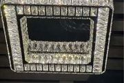 Crystal Chandelier with stainless steel and mirrored finish. 3 colour options. Remote Control.