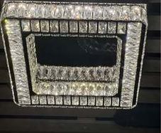 Crystal Chandelier with stainless steel and mirrored finish. 3 colour options. Remote Control.
