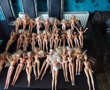 31 Barbie dolls range from 1966 and 1999