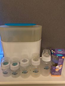 Avent steriliser + 5 avent baby bottles + 1 lansinoh baby bottle