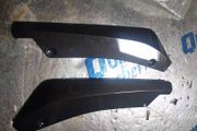 Rear bumper spats, lip extension
