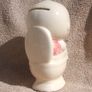 A vintage novelty money box in form of a young child sitting on a toilet (1930s to 1960s) Image 4