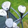 golf bag, trolley, and a couple of clubs Image 2