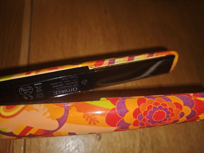 Amika hair straightener model AM1855