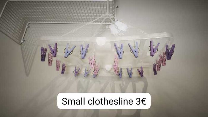 Hanging clothes dryer with pegs