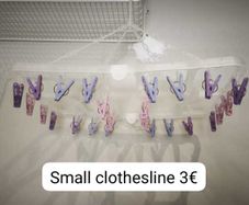 Hanging clothes dryer with pegs