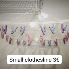 Hanging clothes dryer with pegs