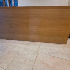 Oak effect headboard with storage.