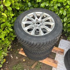 Ford alloys with tires 215/60R16