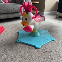 Spinning ride on unicorn
