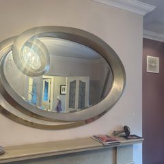 Beautiful gold colour mirror with twist detail