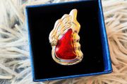 Unique design ring with a red angel wing stone