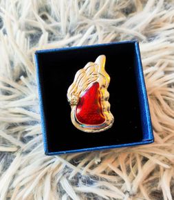 Unique design ring with a red angel wing stone