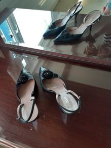Black Prada sling back stilettos