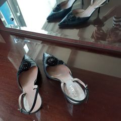 Black Prada sling back stilettos