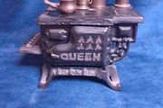 Cast iron miniaturee Queen toy stove
