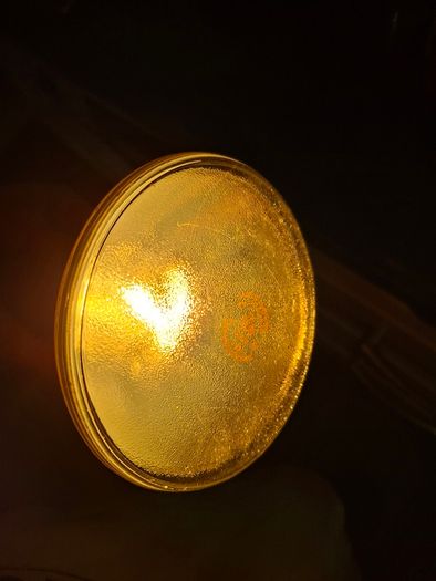 Large Theatrical or Display Lighting, including reflector lamps and colored PAR-style bulbs, with various lamp holders, plugs, and coiled electrical leads all working