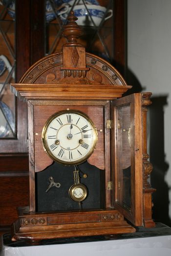 Antique Wood Carved P.H. S. 1800s Mantel Clock (in working order -  the clock doesn't ring) 21,5" x 11"