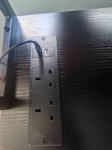 Desk with built in plugs