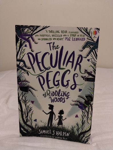 The peculiar peggs of Riddling Woods by Samuel J. Halpin