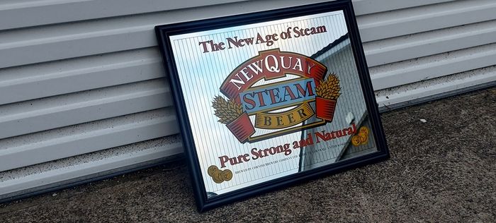 The New age of steam beer mirror ,,newquay,lovely advertising display beer mirror,,nice in any home bar or man cave pub restaurant etc, buyer collects, see pictures for condition, sold as seen.