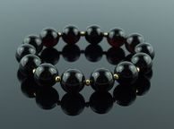 main image for ad Luxury Dark Cherry Baltic Amber 14mm Beaded Stretch Bracelet with 3mm Gold Plated Spacers for Women Genuine Amber Beads Bracelet for Women