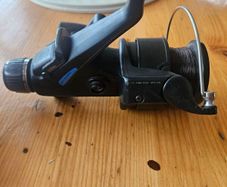 Daiwa BR2650X graphite baitrunner/spinning fishing reel with a 4.9:1 gear ratio. IN GOOD CONDITION.  SEE PHOTOS FOR SAME