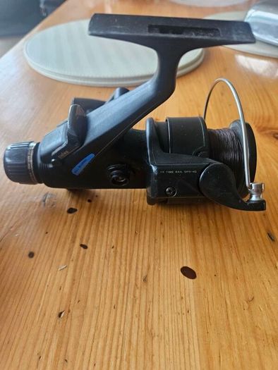 Daiwa BR2650X graphite baitrunner/spinning fishing reel with a 4.9:1 gear ratio. IN GOOD CONDITION.  SEE PHOTOS FOR SAME