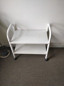 small wooden trolley/shoe rack with wheels