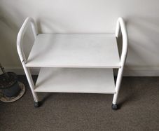 small wooden trolley/shoe rack with wheels