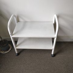 small wooden trolley/shoe rack with wheels