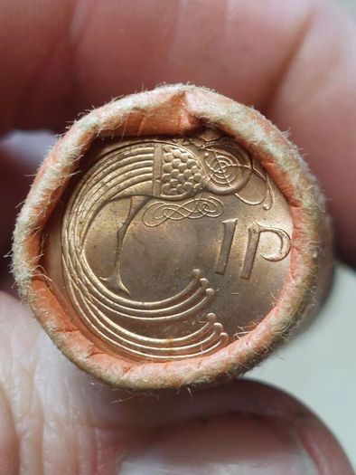 unc roll of penny's two rolls