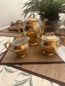 Coffee pot set with cups and saucers