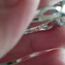 A 925 sterling silver ring with a floating diamond centerpiece. Image 8