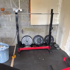 Adjustable squat and bench rack